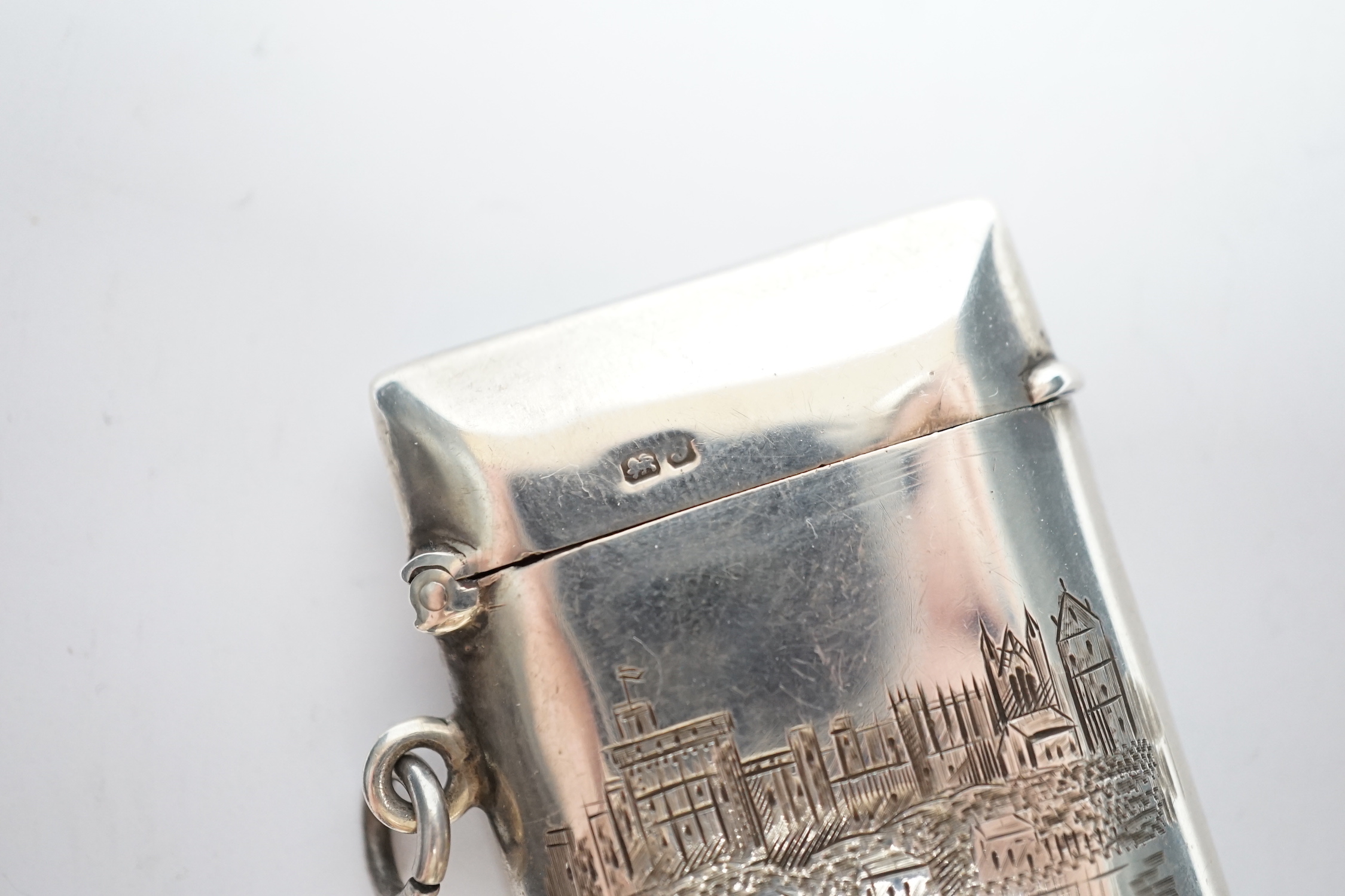 An early 20th century silver vesta case, engraved with scene of Windsor Castle, John Milward Banks, Chester, 1909?, 50mm.